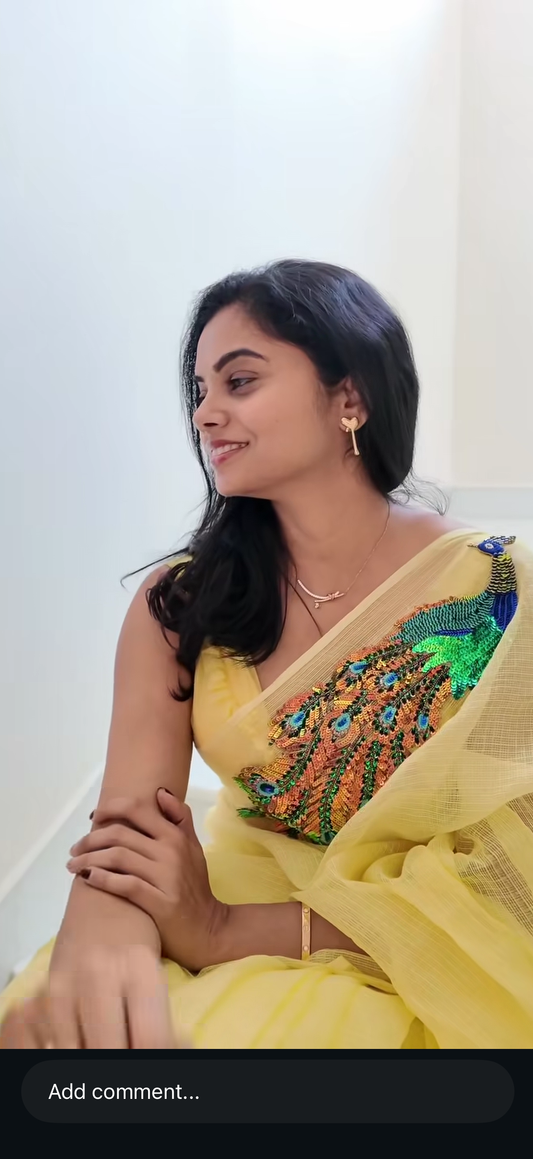 Butter yellow peacock embroidered kota saree