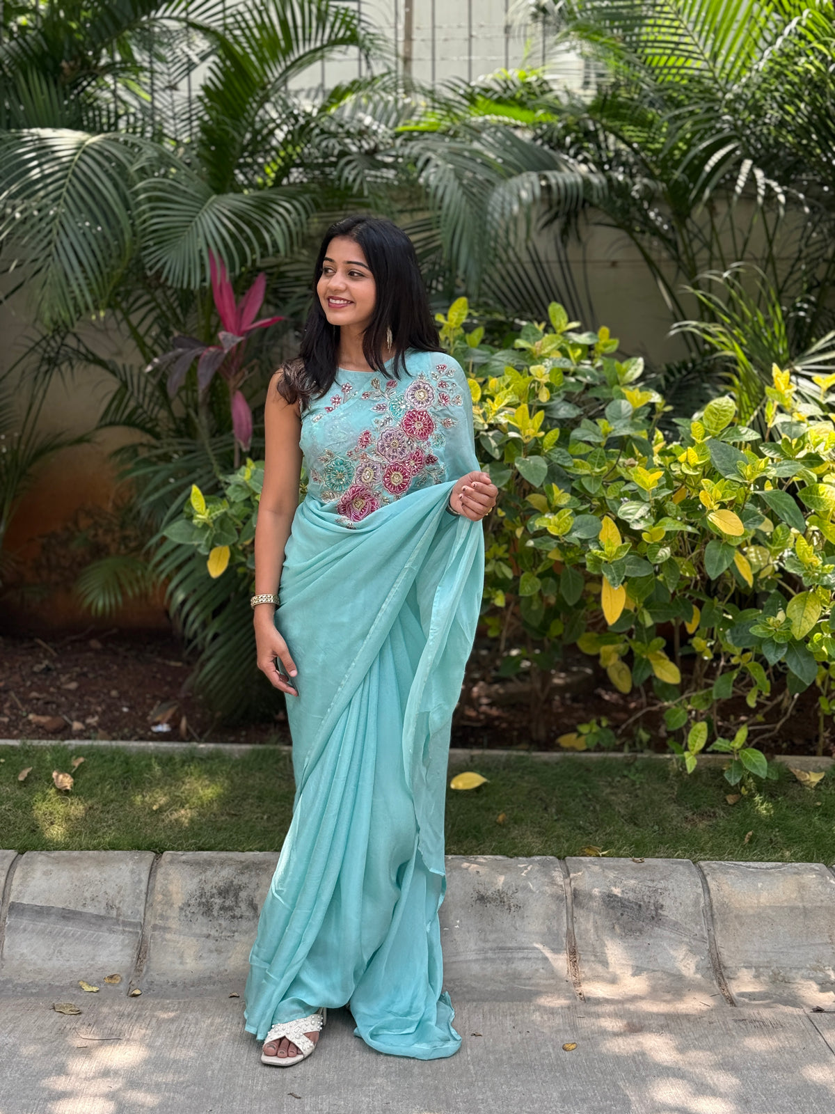 Aqua blue floral embroidered saree