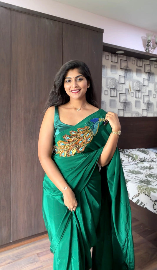 Bottle green pure crepe peacock embroidered saree