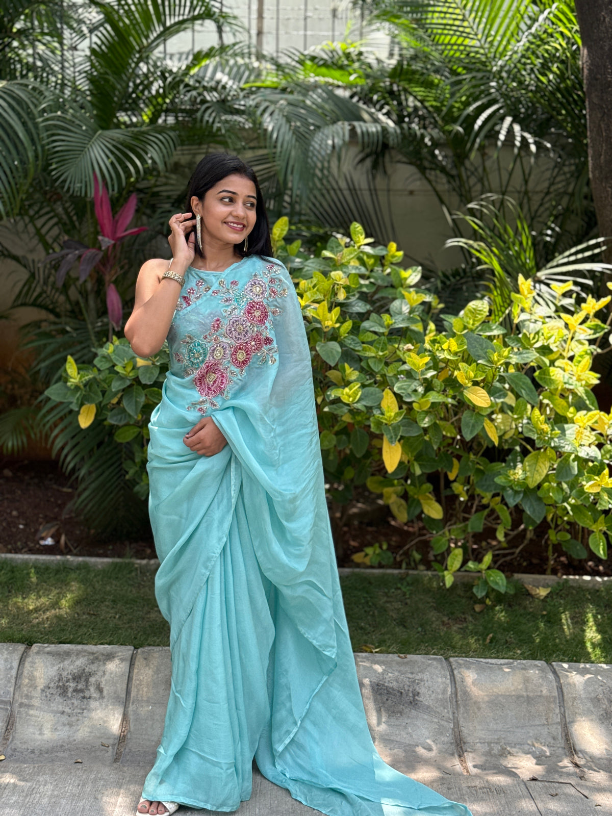 Aqua blue floral embroidered saree