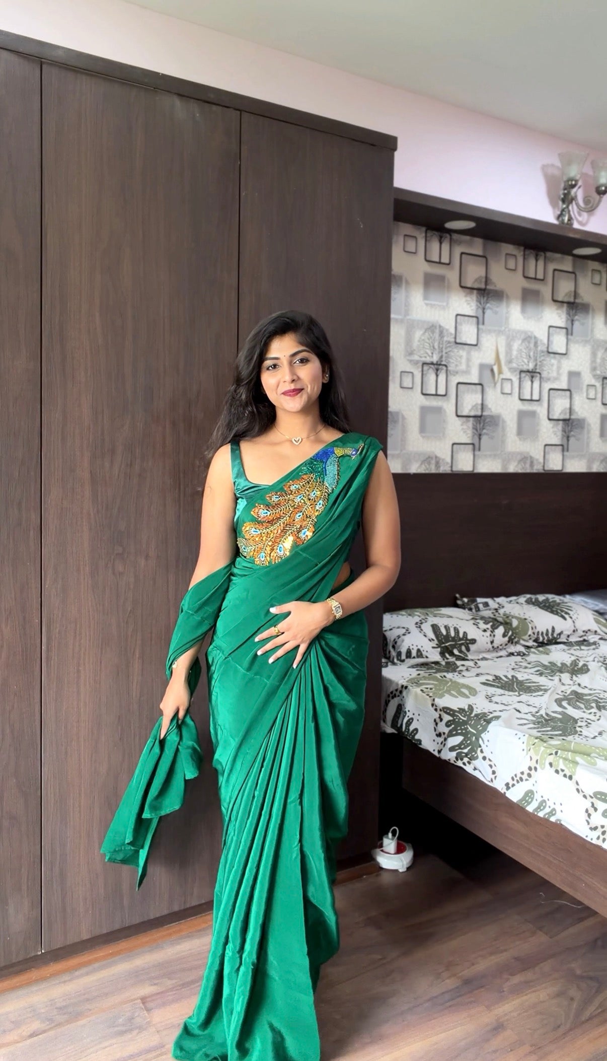 Bottle green pure crepe peacock embroidered saree