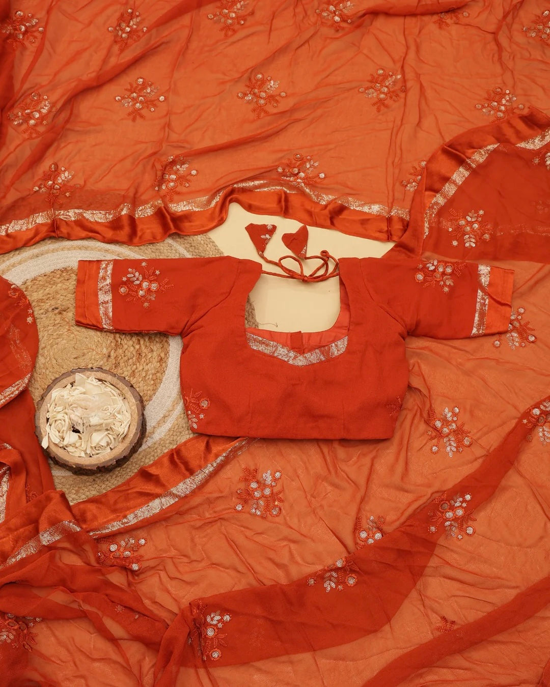 Kiara-orange embroidered saree